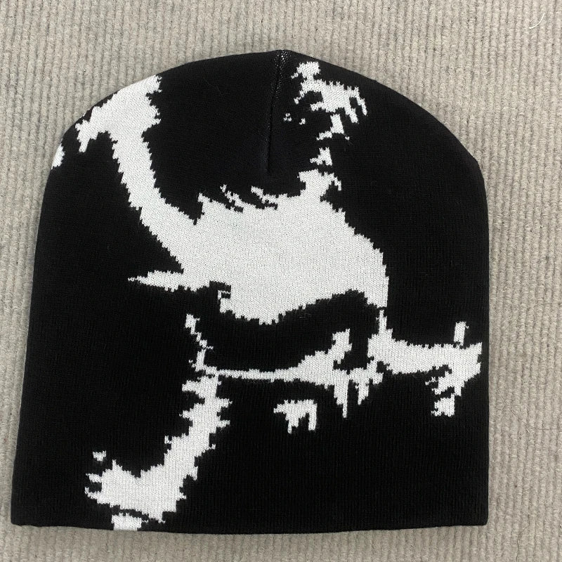Black knit embroidered hat trendy with bold white pixelated dragon graphic for fashion streetwear Y2K style