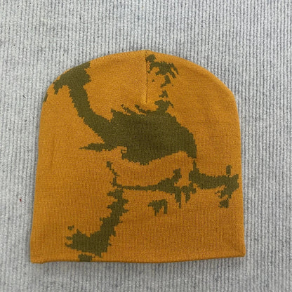 Mustard yellow knit beanie with embroidered dark green dinosaur graphic fashion streetwear y2k solid color letter cap