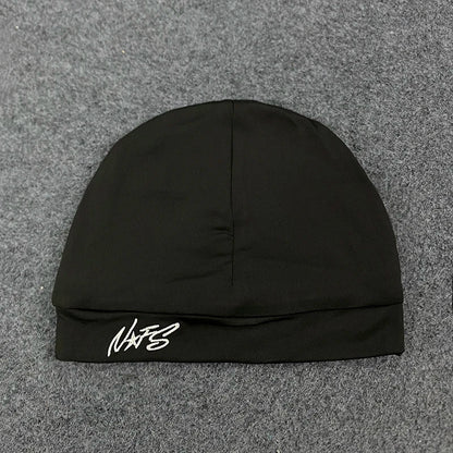 Black knit pullover hat trendy with white letter embroidery on folded brim casual versatile fashionable streetwear item