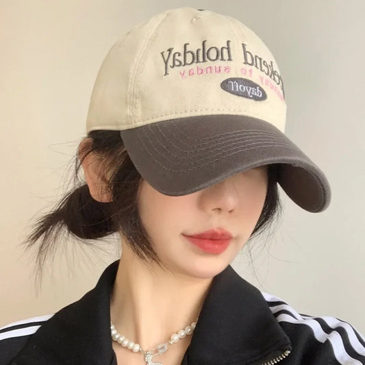 Beige and dark gray baseball cap with embroidered yasb logo in black pink and white thread quick-drying and breathable