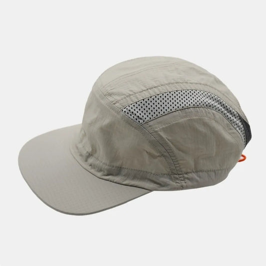 Beige lightweight five-panel baseball cap with perforated mesh panel and orange adjustable strap for quick drying