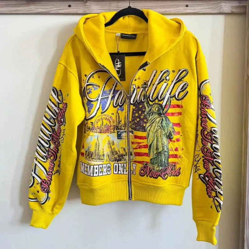 Bright yellow zipper sweatshirt jacket with bold graphic design hoodie y2k featuring statue of liberty and new york skyline