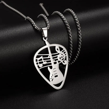 Silver guitar pick-shaped pendant necklace with intricate cut-out design featuring musical notes for retro punk music gifts