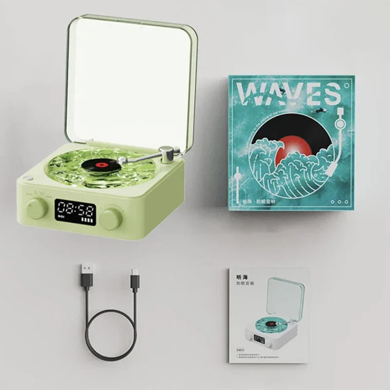 Pastel green retro turntable speaker with wireless bluetooth vinyl support and rgb projection lamp effect on illuminated surface
