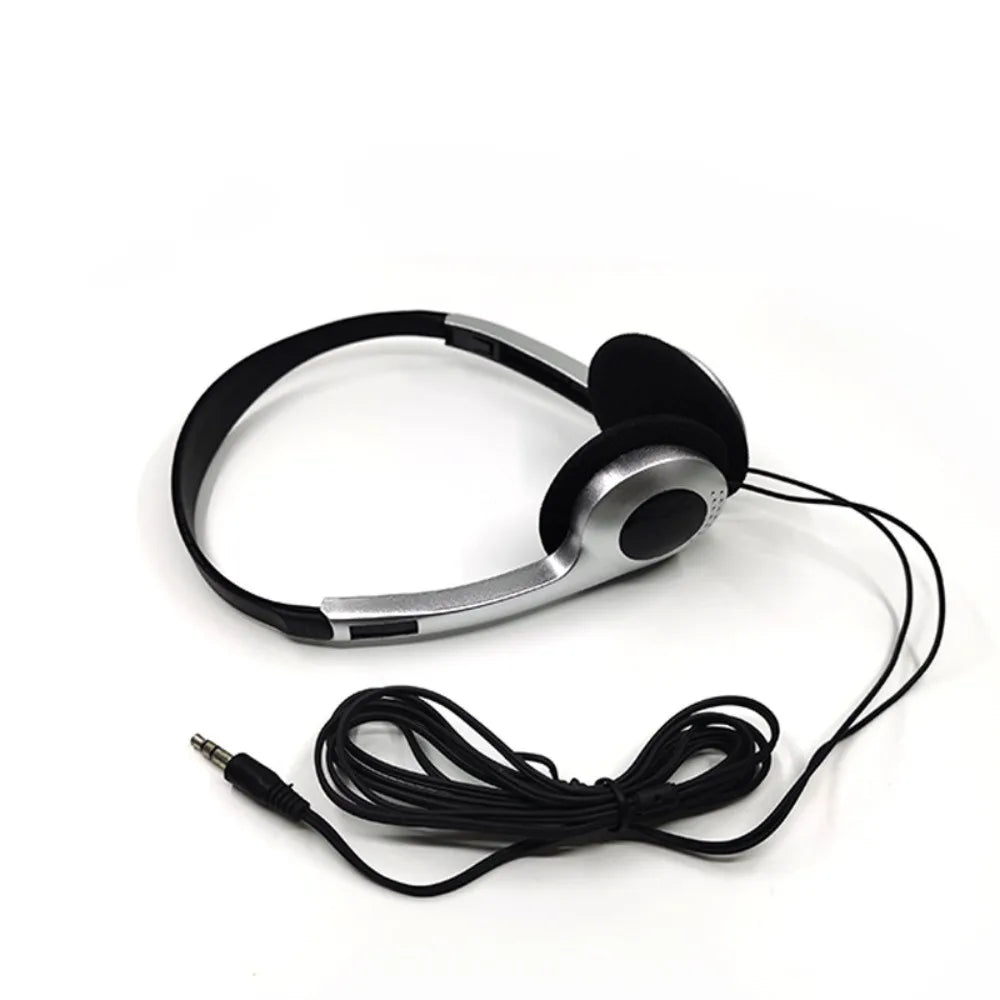 Silver and black retro wired headphones with coiled audio cable showcasing walkman earphone personality for hip hop trends