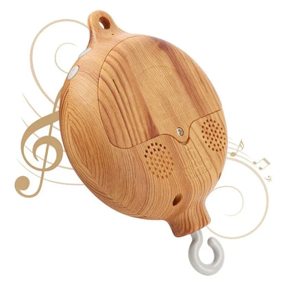 Wooden revolving music box with natural grain finish, perforated grilles, and hooks for newborns baby crib rattle soothing toy