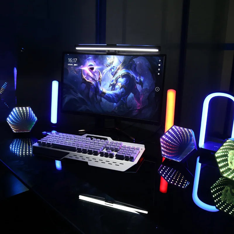 White mechanical gaming keyboard with rgb backlighting and sleek angular design beside rgb 3d hexagonal mirror tunnel desktop ambient lamp