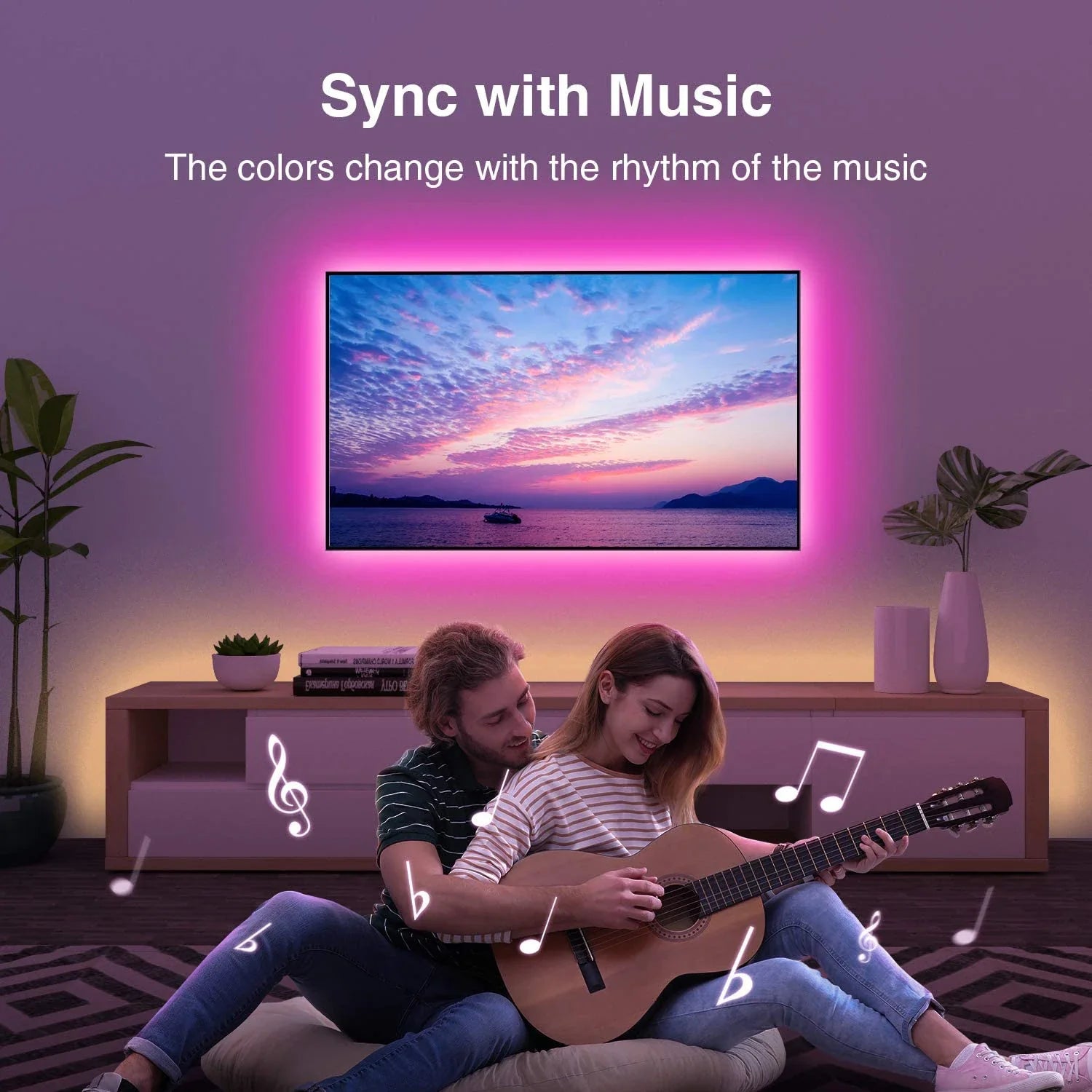A sleek slim rgb led strip with vibrant pink glow syncs to music ideal for tv backlight and room decoration