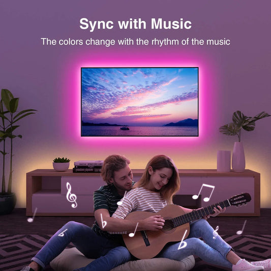 A sleek slim rgb led strip with vibrant pink glow syncs to music ideal for tv backlight and room decoration