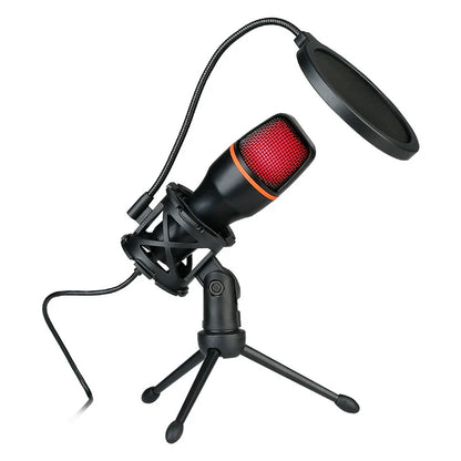 Black rgb professional microphone with red mesh grille and pop filter mounted on tripod for podcast recording studio streaming laptop use