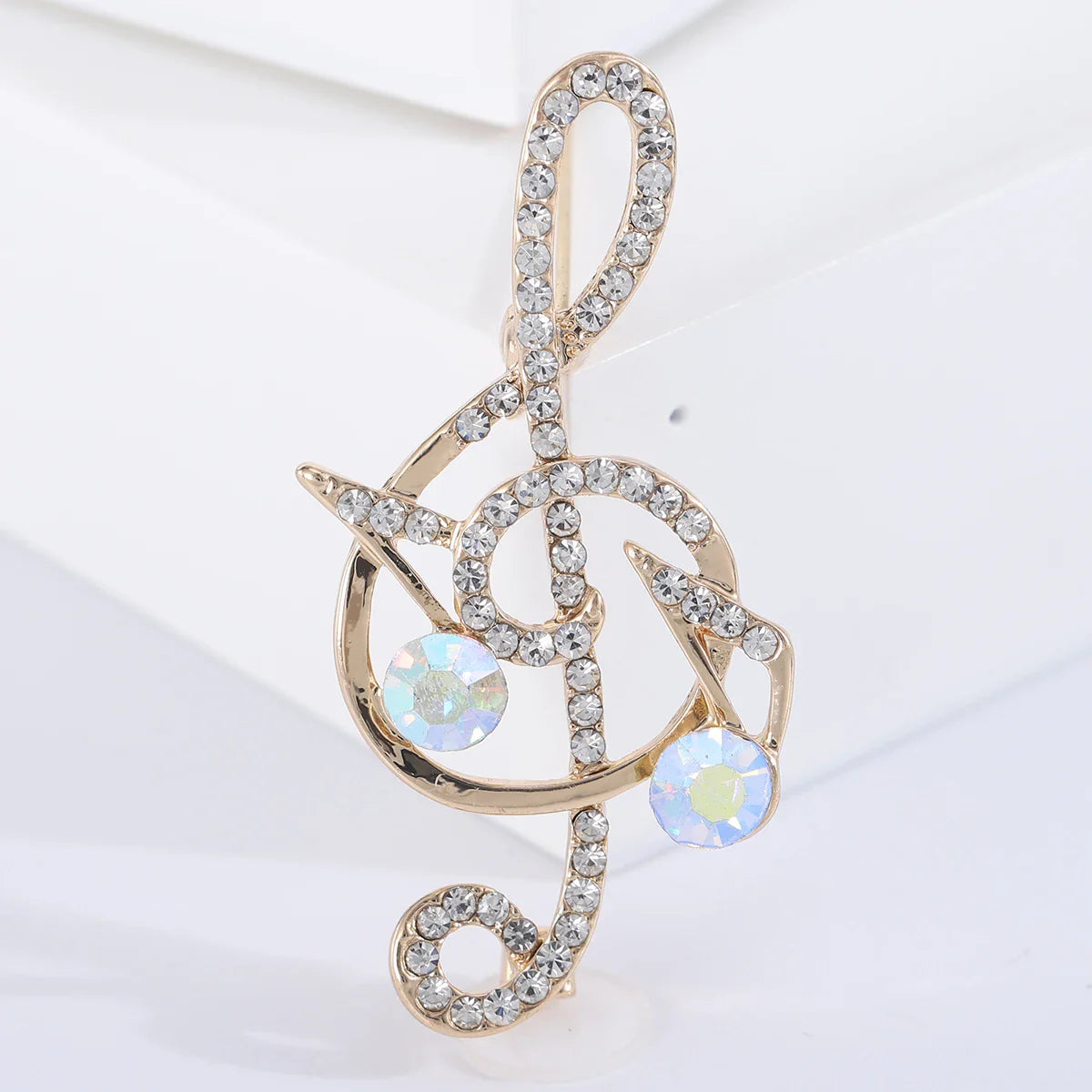 Gold-tone shiny glass musical treble clef brooch with clear rhinestones for event party backpack decoration