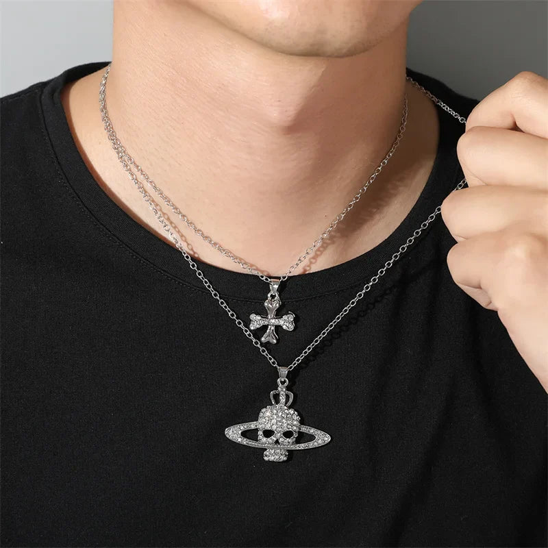 Silver rhinestone skull pendant chain necklace vintage punk goth style featuring vivienne westwood planet ring logo