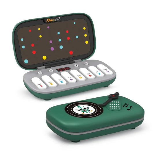 Green plastic rhythm master music pocket piano with colorful keys and matching vinyl record player accessory for children