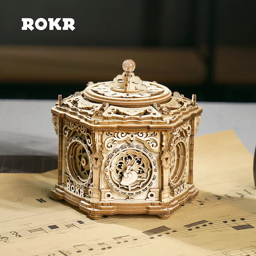 Intricately carved wooden robotime rokr assemble music box with ornate scrollwork and secret garden 3d wooden design