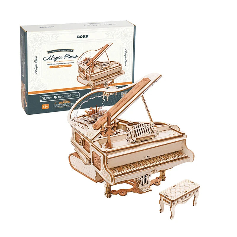 A wooden rokr magic piano model kit with intricate laser-cut details and natural light wood finish mechanical music box