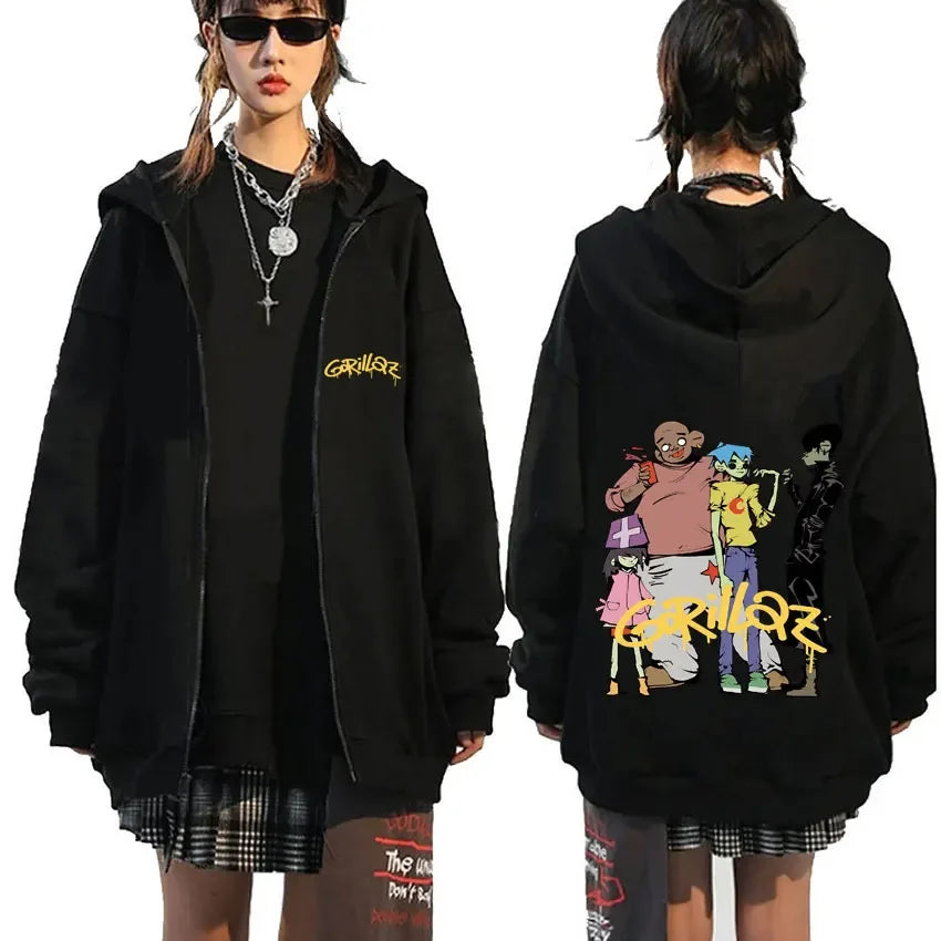 Black zip-up hoodie featuring vibrant demon days eyes graphic and yellow gorillaz lettering for hip hop fashion fans
