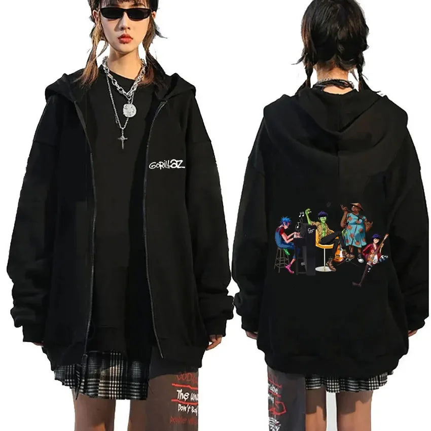 Black zip up gorillaz hoodie with colorful band illustration on back and white demon days eyes logo front hip hop fashion