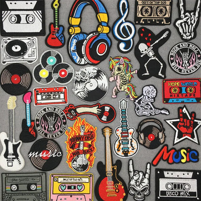 A vibrant collection of embroidered punk patches with guitar stripes iron on designs and colorful clothing diy appliques