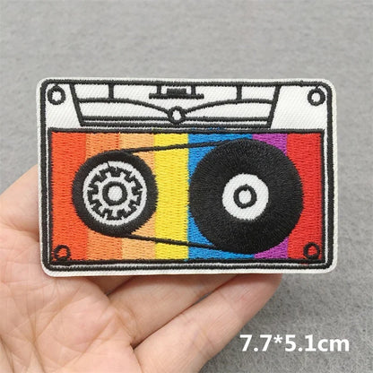 Rainbow-colored embroidered cassette tape patch with black reels and white accents for music embroidered patches clothes stickers diy jacket jeans headset