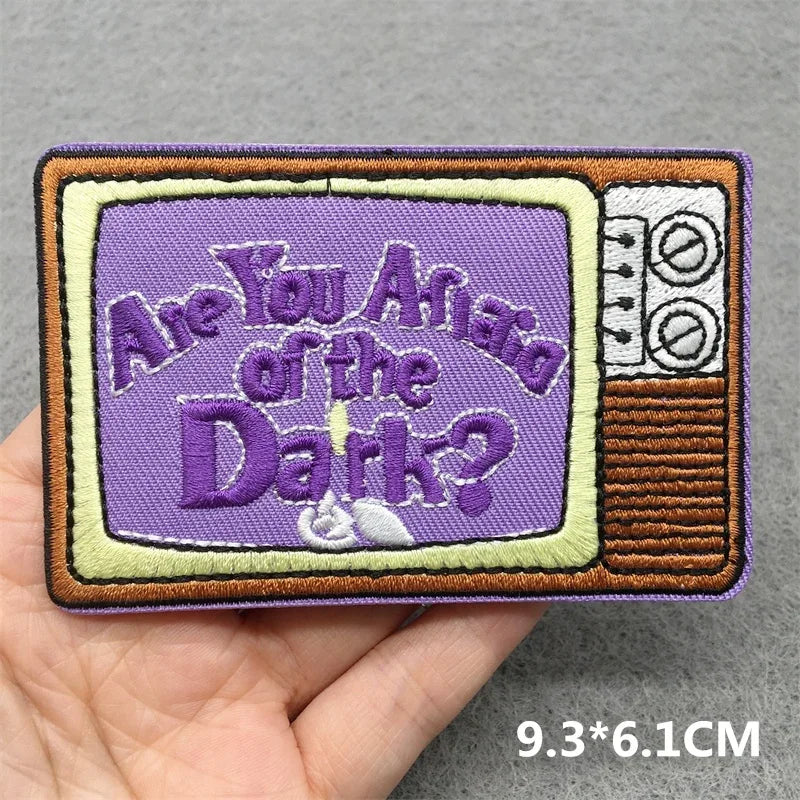 Purple embroidered patch shaped like vintage tv with are you afraid of the dark text, ideal for jacket jeans headset DIY clothes stickers music patches