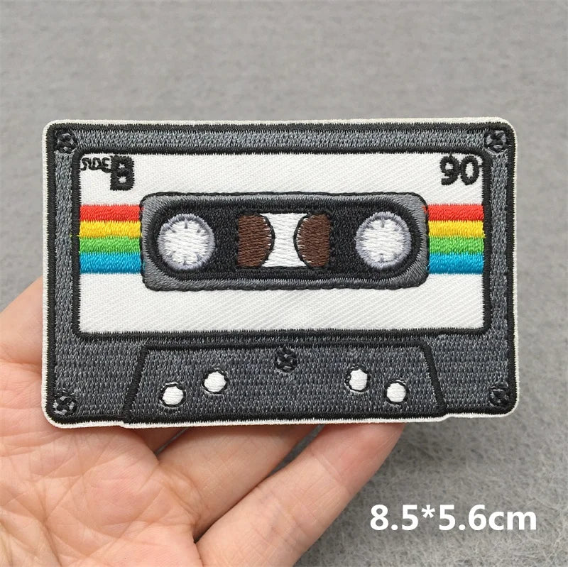A gray and white vintage cassette tape music embroidered patch with rainbow stripes for jacket jeans headset clothes stickers diy