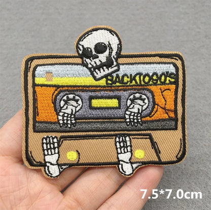 Beige embroidered patch with cartoon cassette and skeleton design for music embroidered patches clothes stickers diy jacket jeans headset