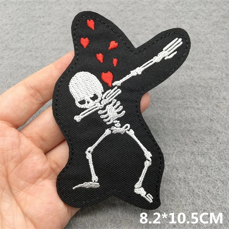 Black embroidered patch featuring a white skeleton dabbing with red hearts for music embroidered patches clothes stickers diy jacket jeans headset