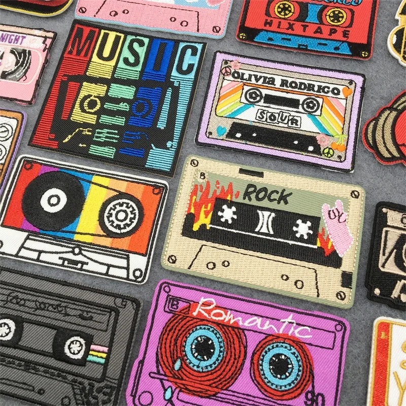 A collection of colorful music embroidered patches featuring vibrant cassette tape designs for jacket jeans headset diy clothes stickers