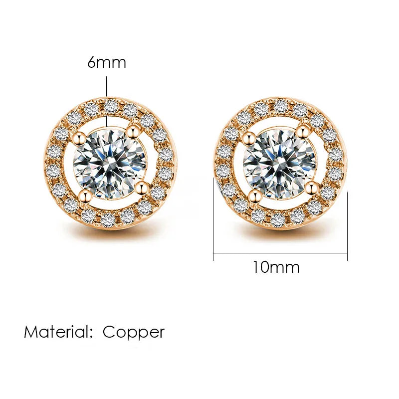 Gold-toned copper hip hop stud earrings with central round diamond halo and dimensions marked 6mm by 10mm
