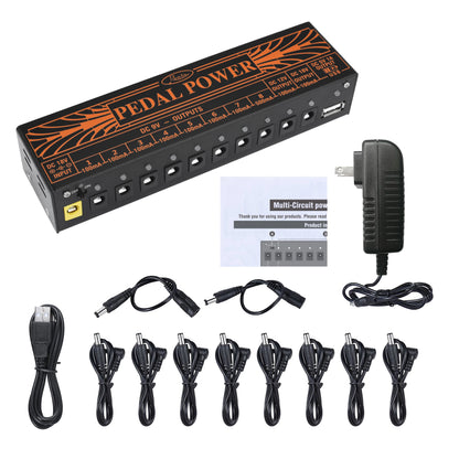 Black rectangular pedal power supply unit with orange branding and multiple output ports for pure echo mod station and auto wah pedals