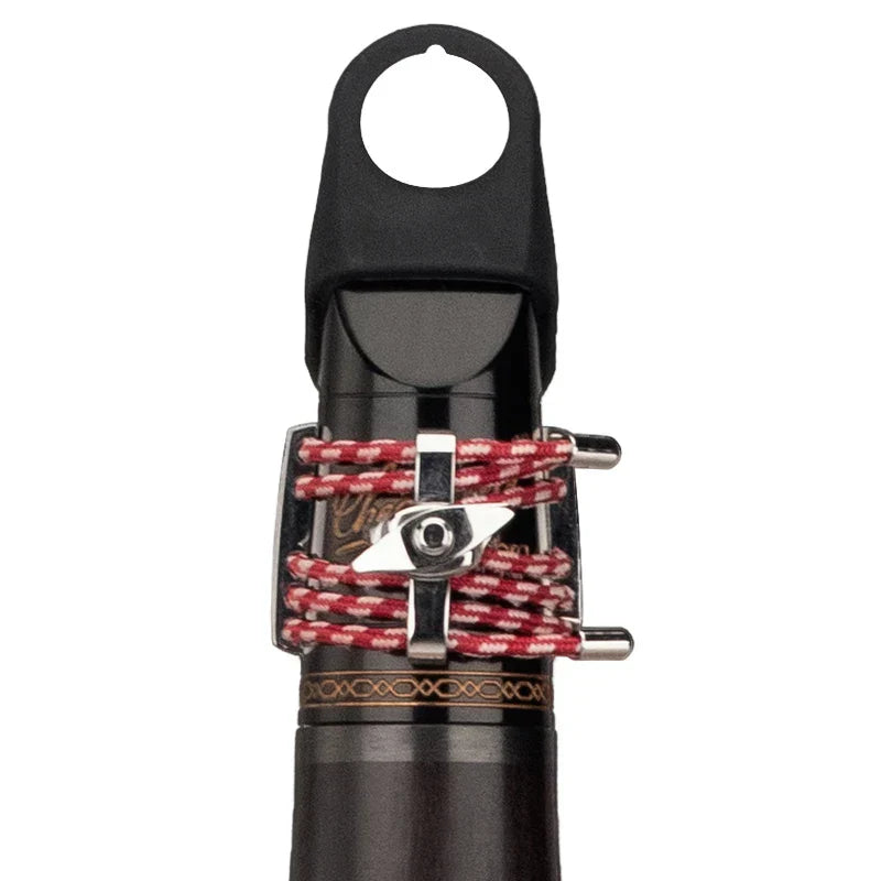 Black soprano saxophone mouthpiece with silver ligature and red white braided cord from products ebony solo black tube series