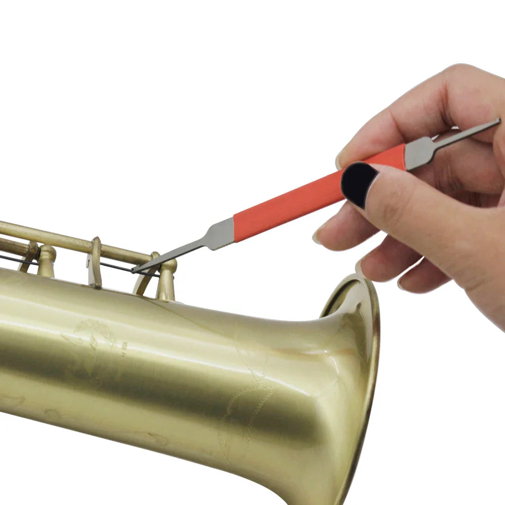 Orange-handled saxophone needle spring hook with metallic tip used on brass instrument for accessories double hooks repair