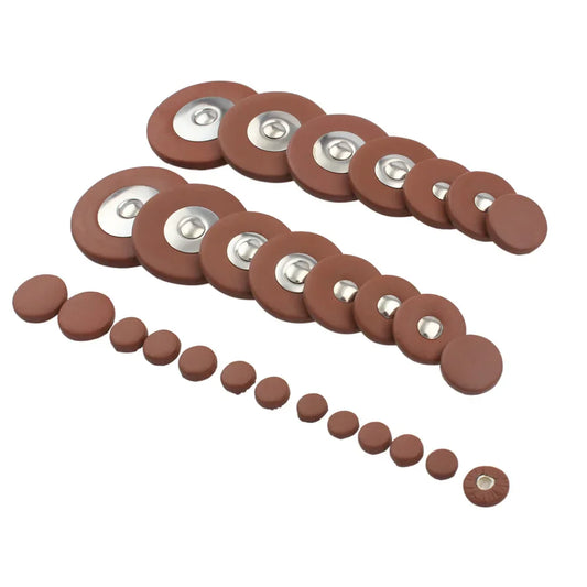 Set of brown circular saxophone pads universal button leather pads with metallic centers for woodwind instrument accessories