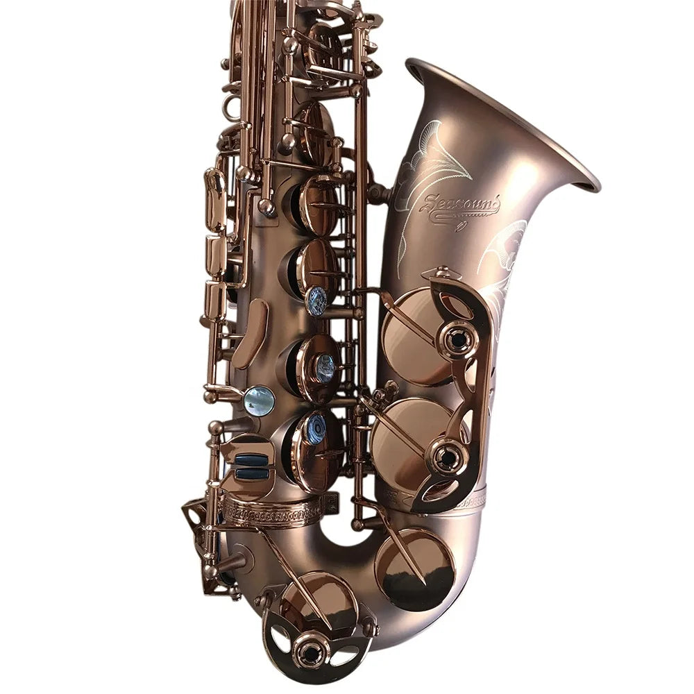 A sleek rose gold seasound oem professional alto saxophone jyas102cfmt with floral engraving and blue key accents