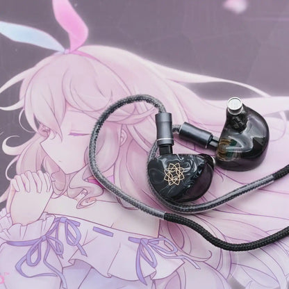 Black glossy bravery black 4ba in-ear monitors with gold atomic lattice engraving and balanced armature driver resin body