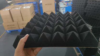 Black triangular self-adhesive soundproof foam panels with textured porous surface for eggcrate acoustic wall use