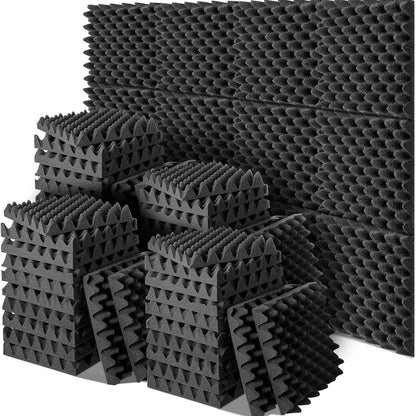 Black triangular self-adhesive soundproof foam panels with eggcrate acoustic wall texture stacked for home and studio use