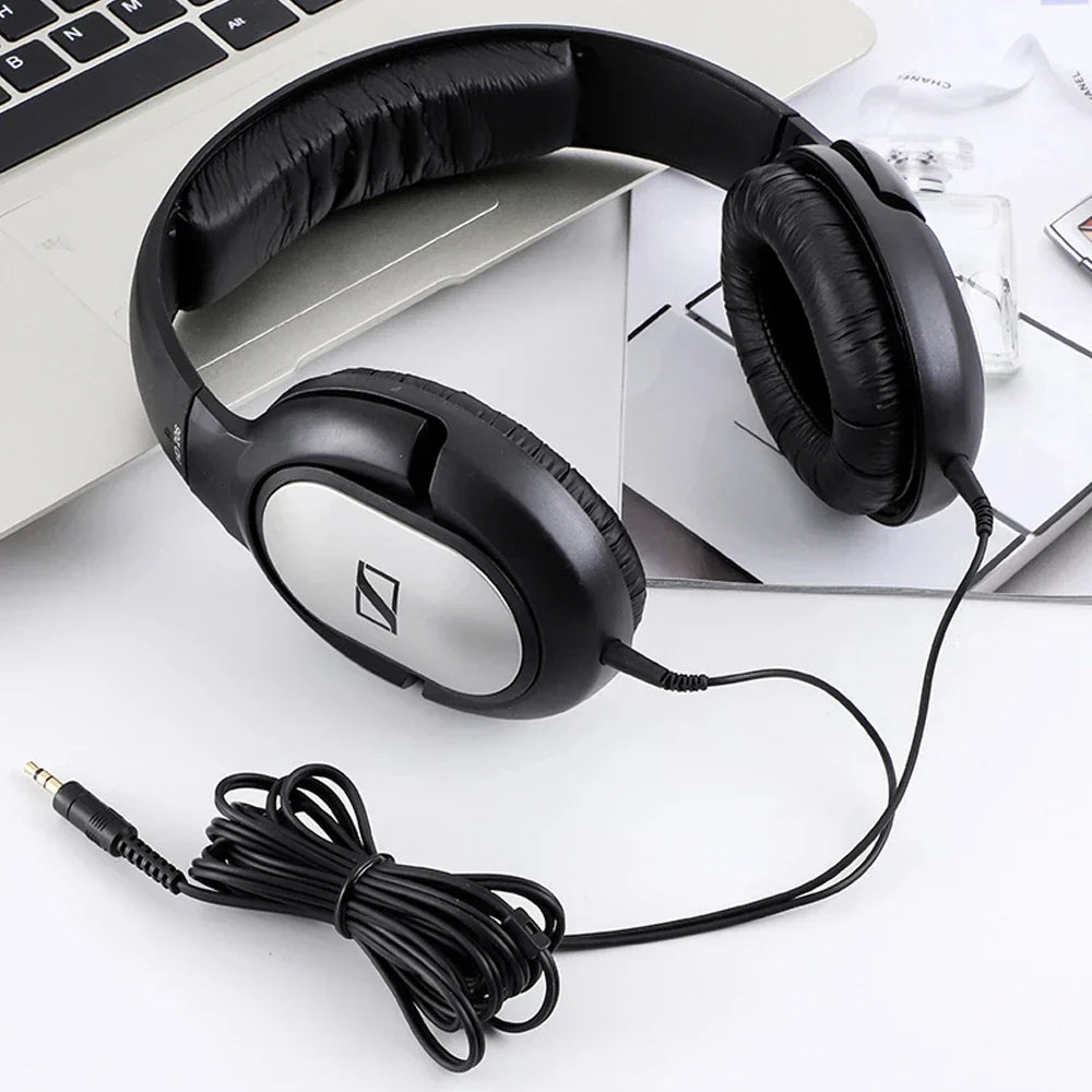 Black sennheiser hd206 ear studio headphones with silver accents padded earcups and headband for monitor dj headset use