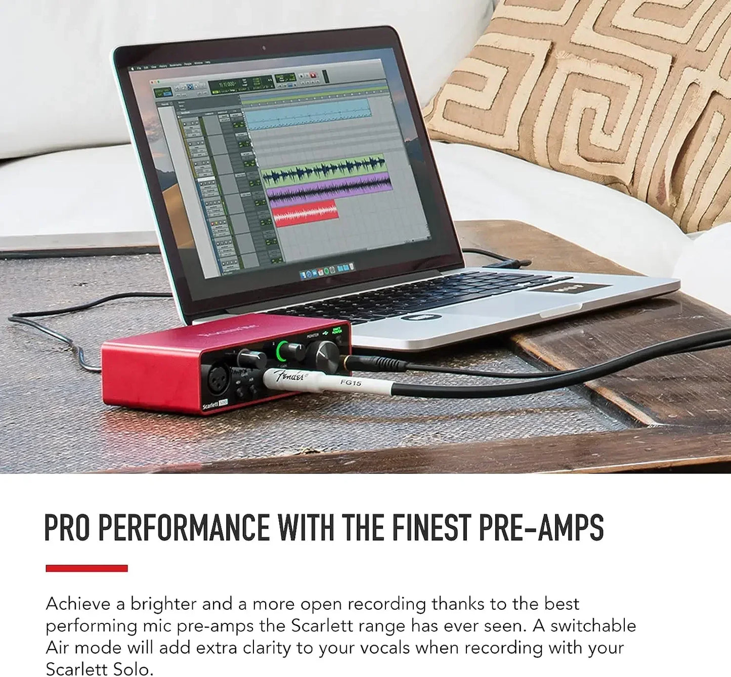 Red scarlett solo audio interface with black knobs and white cables paired with sennheiser mk4 large karaoke condenser microphone for live broadcast professional use