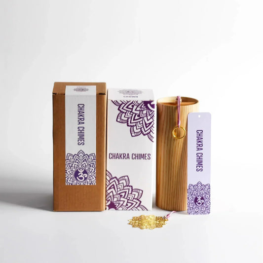 Wooden cylindrical seventh chord wind chime with gold ring and pink string in purple mandala boxes for meditation yoga japanese use