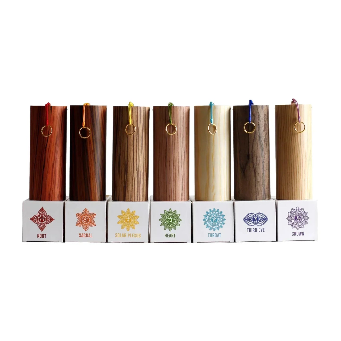 Set of seven wooden chakra tuning forks with engraved symbols and colors for meditation yoga japanese seventh chord wind use