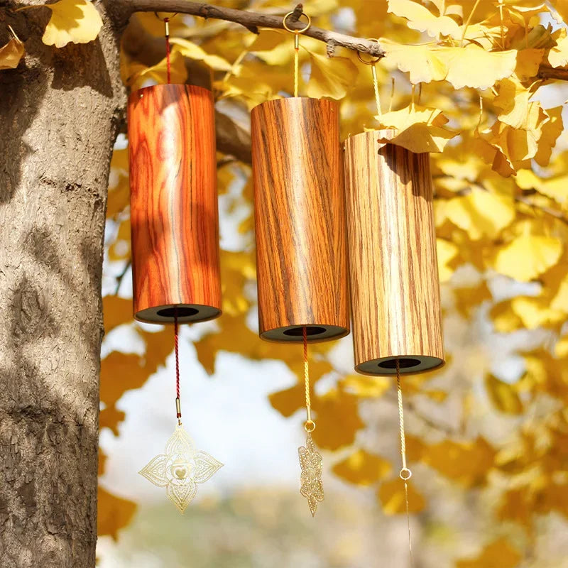 Three cylindrical wooden seventh chord wind chimes with metallic charms for meditation yoga japanese diatonic sound