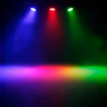 Three stage lights with 36x18w led wash zoom emit blue red green beams on foggy floor for disco music dance events