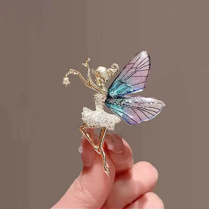 Delicate gold fairy brooch with translucent blue and purple wings and sparkling crystal dress for women clothing decoration