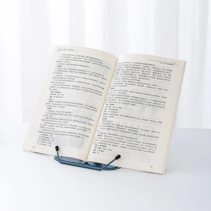 Blue plastic arms with black clips on a foldable metal reading stand adjustable bookshelf portable music score stand