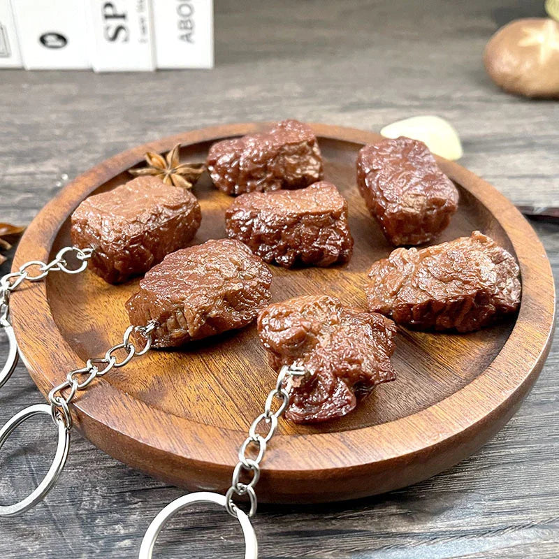 Brown simulation beef keychain charms with glossy finish on metallic silver chains imitation food pvc beef grain keychain