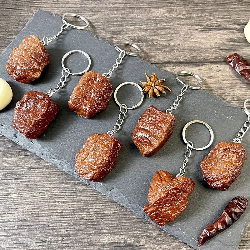 Simulation beef block keychain featuring crispy brown imitation food pvc beef grain cubes with silver metal ring and chain