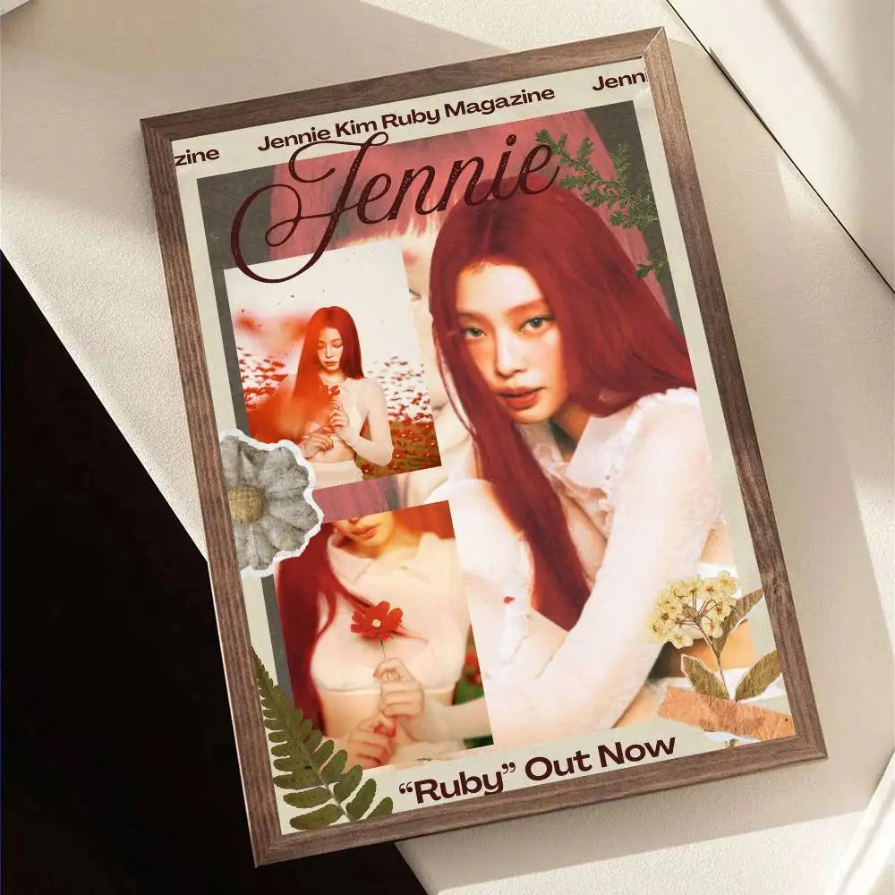 A framed magazine cover poster of singer Jennie Kim with red hair and white outfit decorated with floral stickers for wall decor