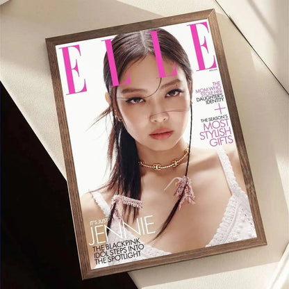 A framed elle magazine cover featuring Jennie from blackpink in bold pink lettering wood frame wall art decor