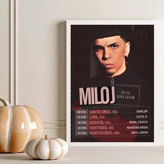 A framed poster mural of Colombian singer Miloj with bold pink text and tour dates, ideal office wall decor gift